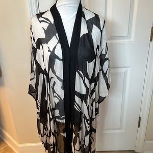 NWOT Kimono topper featuring a solid BLACK banded neckline & relaxed drape.